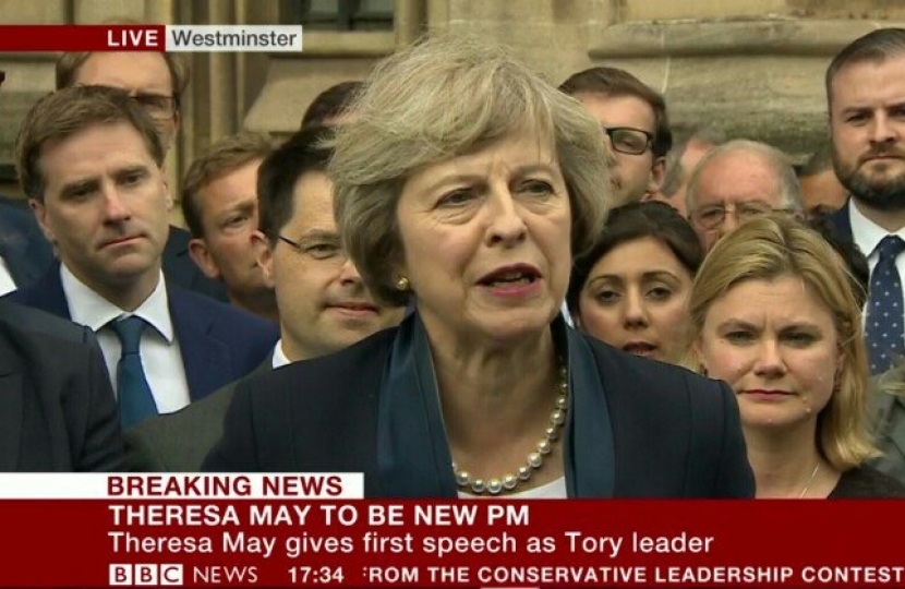 Andrew outside parliament with Theresa May